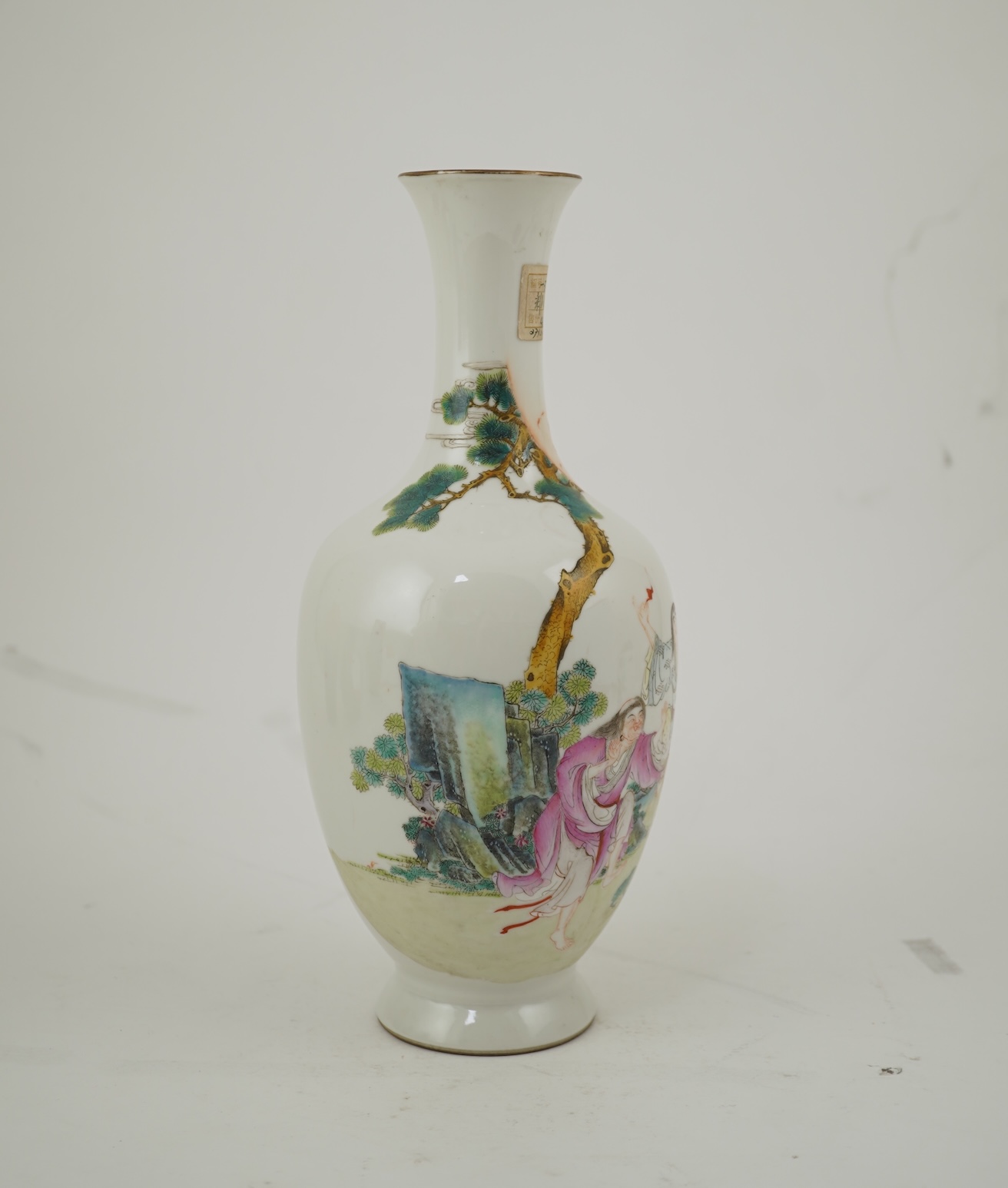A Chinese famille rose ‘Liu Hai’ bottle vase, Qianlong six character seal mark but Republic period